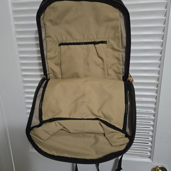 Dakine Camouflage Backpack with Yellow and Brown Accents